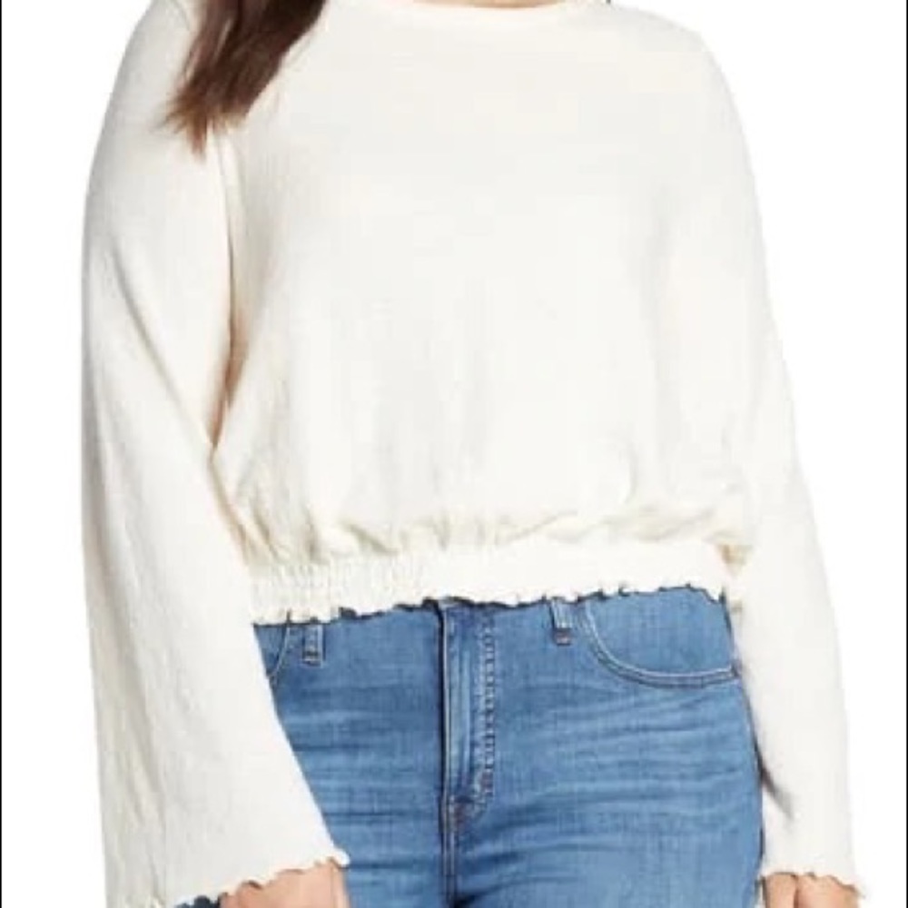Texture and thread smocked bell sleeve top